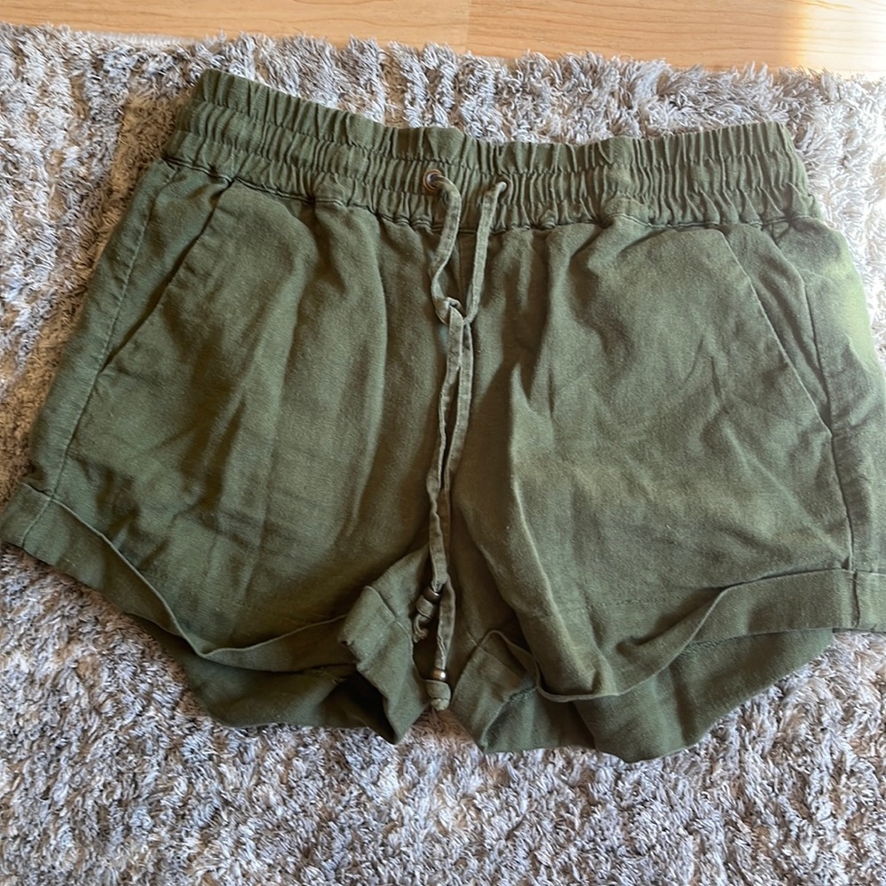 Buy now or make offers! Army green shorts, cargo material. Great condition!
